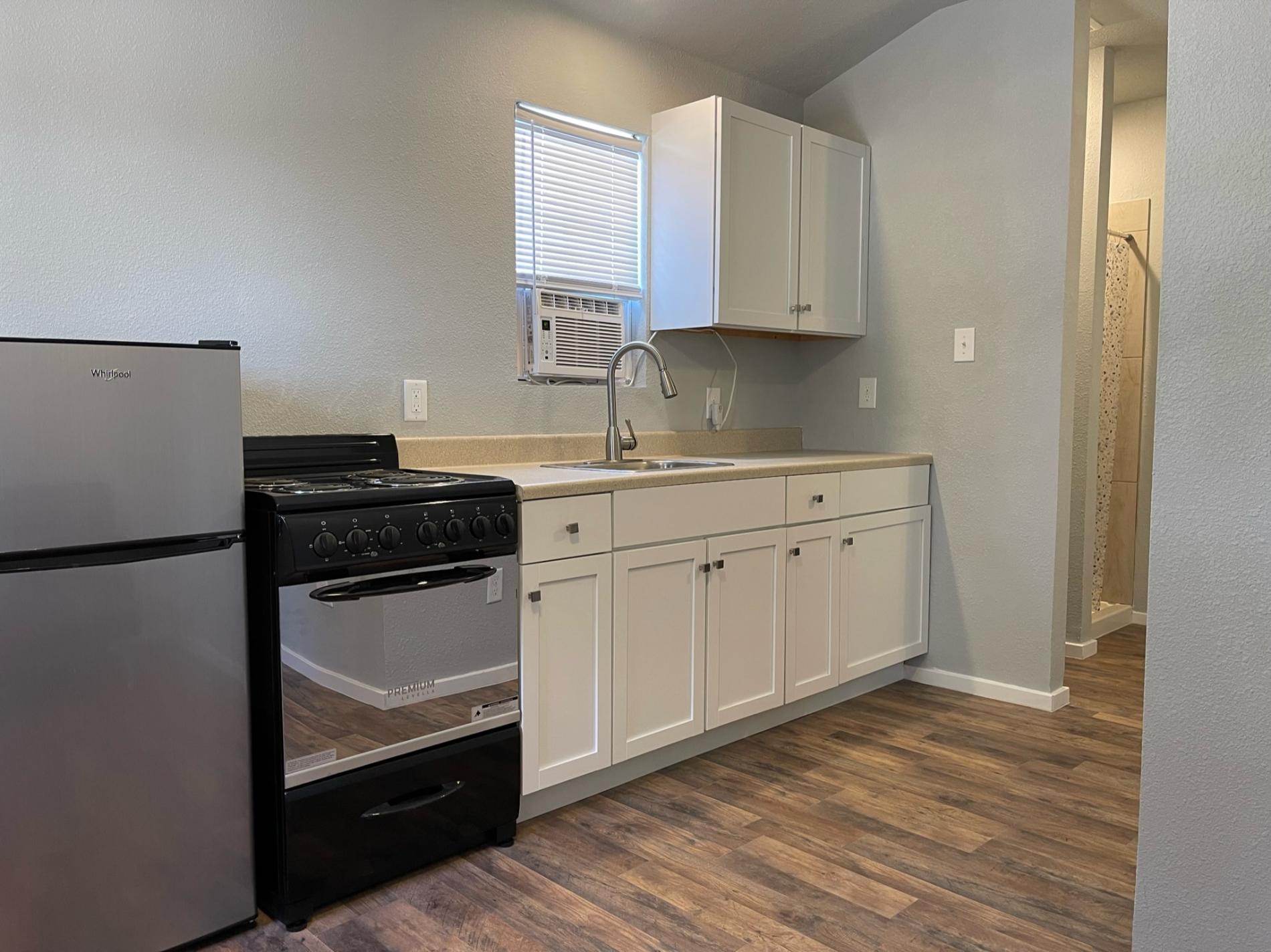 kitchen with refrigerator, stove and dishwasher